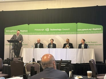 Panelists speaking during the session, “Crafting an AI Roadmap: Strategy and Implementation.”